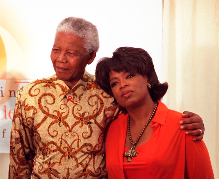 On December 6, 2002 in South Africa with Nelson Mandela / Image: Achievement.org